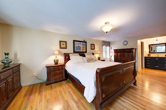 bedroom featuring light hardwood / wood-style floors