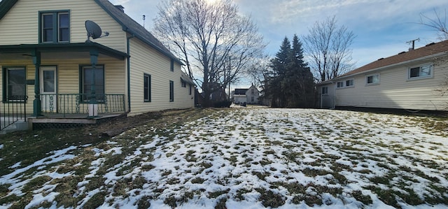 view of snow covered property