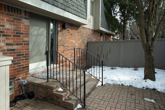 view of snow covered gate