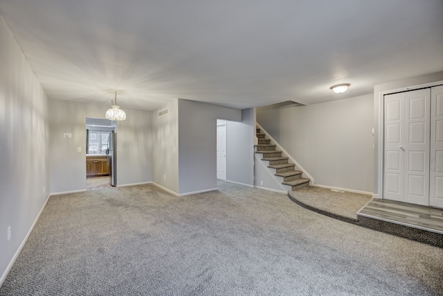 interior space featuring light carpet