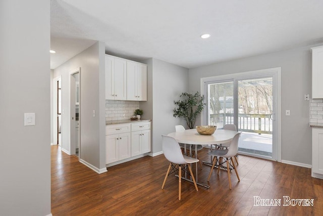 dining room featuring dark hardwood / wood-style floors