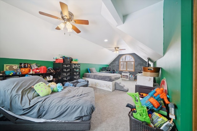 bedroom with lofted ceiling, carpet floors, and ceiling fan