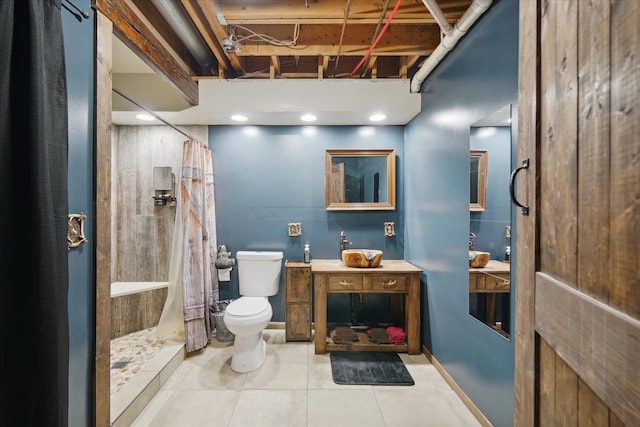 bathroom featuring walk in shower, tile patterned floors, toilet, and sink