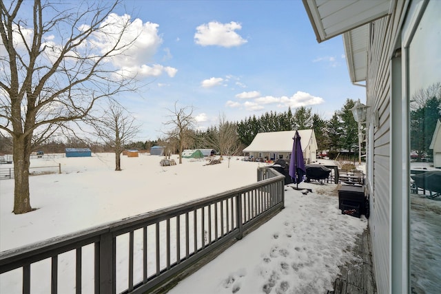 view of yard covered in snow