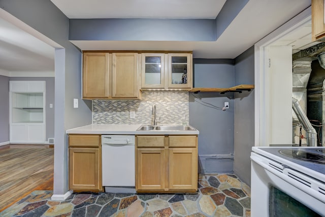 kitchen with sink, white appliances, dark hardwood / wood-style flooring, decorative backsplash, and light brown cabinets