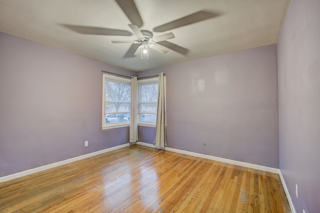 unfurnished room featuring light hardwood / wood-style floors and ceiling fan