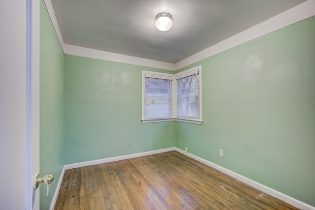 empty room featuring hardwood / wood-style flooring