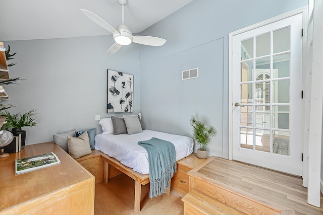 bedroom with vaulted ceiling and ceiling fan