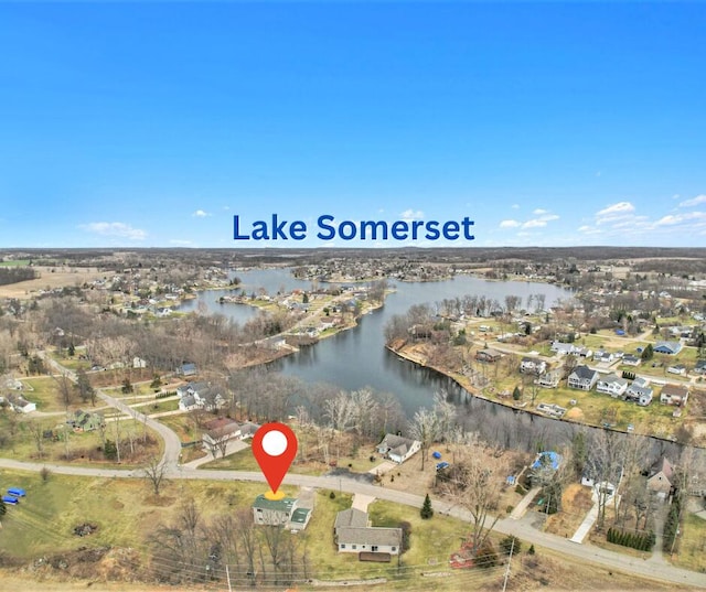 10568 Woodbrook Dr, Cement City, MI 49233 - bird's eye view featuring a water view