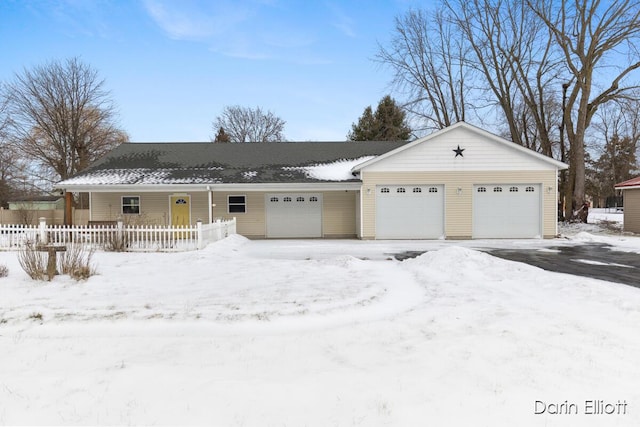 ranch-style home with a garage