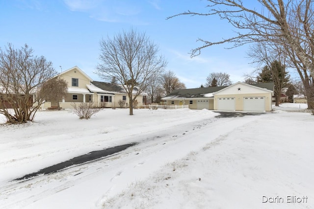 view of yard layered in snow