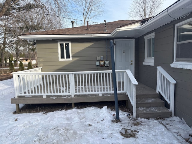 view of snow covered deck