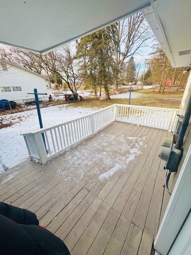 view of snow covered deck