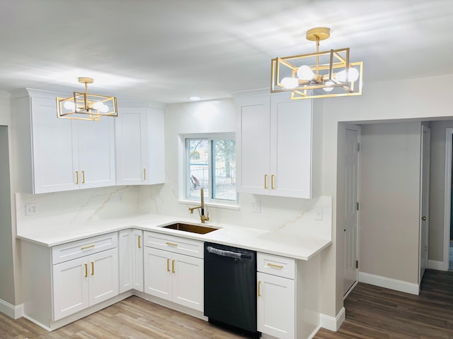 kitchen with hanging light fixtures, dishwasher, white cabinets, and an inviting chandelier