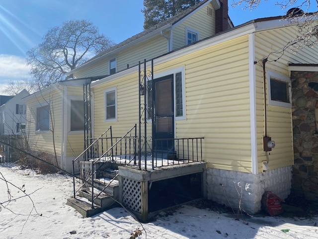 view of snow covered property