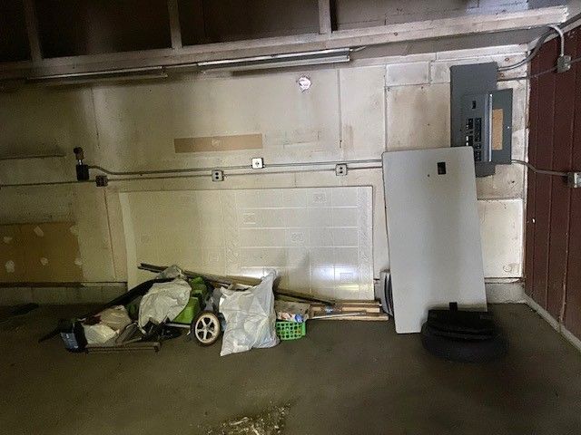 basement with electric panel