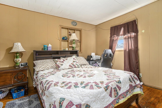 bedroom featuring hardwood / wood-style floors