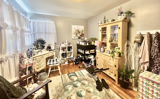 miscellaneous room with light wood-type flooring