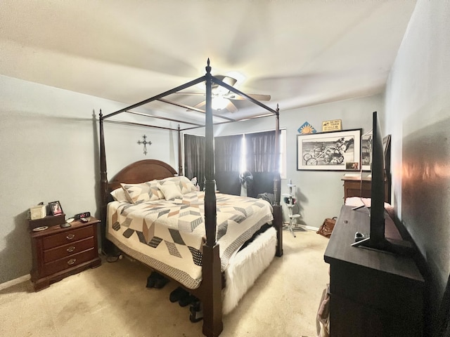 bedroom with light colored carpet and ceiling fan