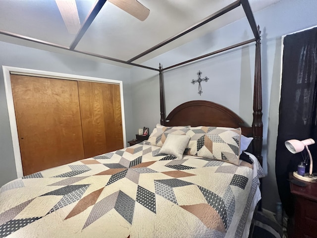 bedroom with ceiling fan and a closet