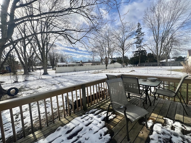 view of snow covered deck