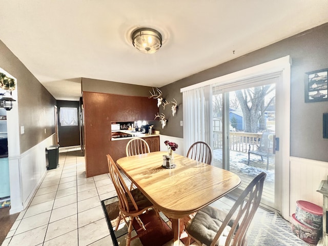 dining room featuring light tile patterned flooring