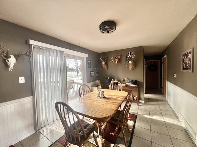 dining space with light tile patterned floors