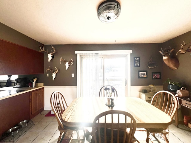 view of tiled dining space