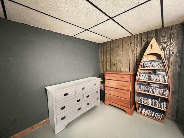 bedroom with wooden walls