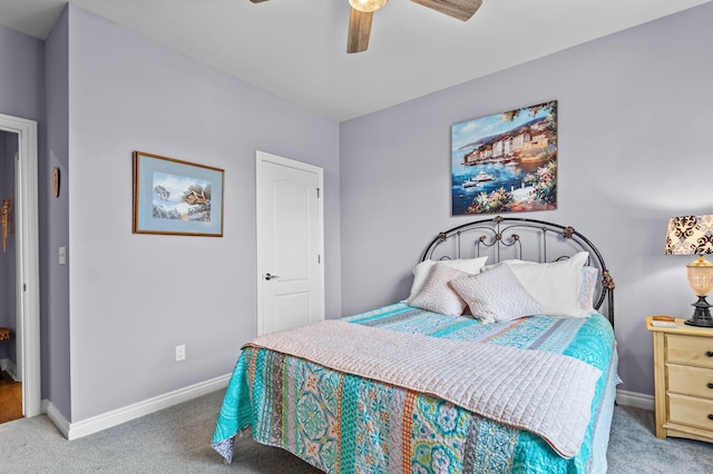 bedroom with light carpet and ceiling fan