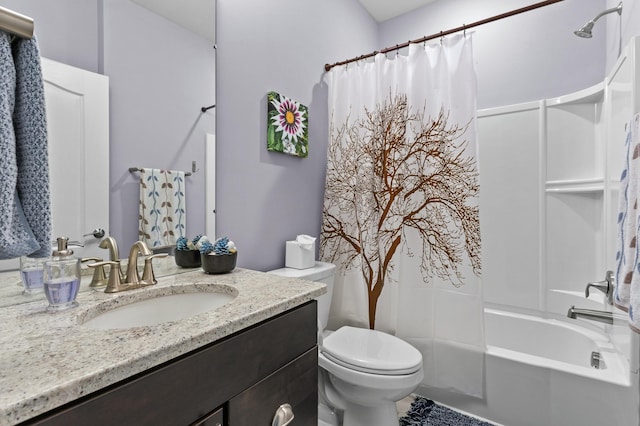 full bathroom featuring vanity, shower / bath combo, and toilet