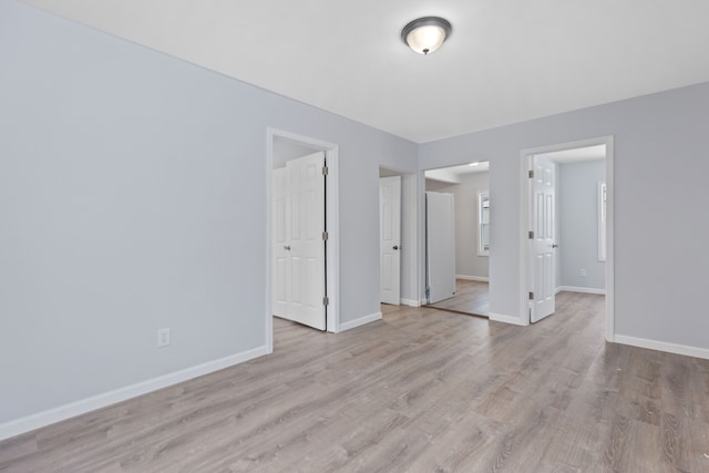 empty room featuring light wood-type flooring