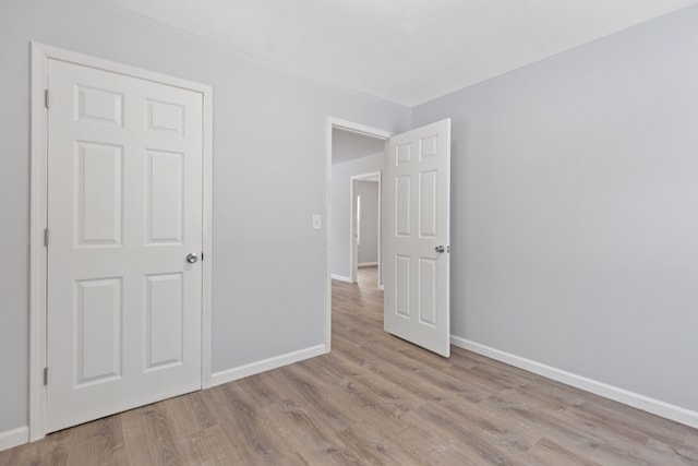 unfurnished bedroom featuring light hardwood / wood-style floors