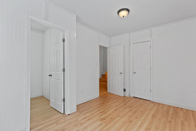 unfurnished bedroom with light hardwood / wood-style floors