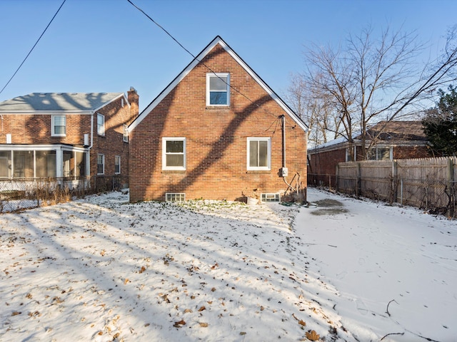 view of snow covered property