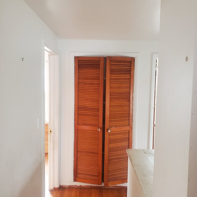 corridor featuring light hardwood / wood-style floors