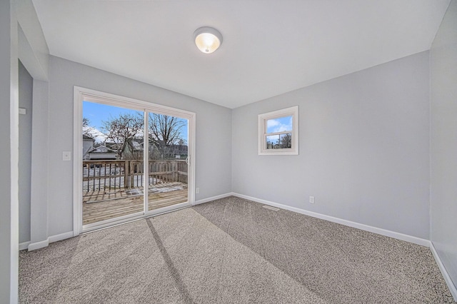 view of carpeted spare room