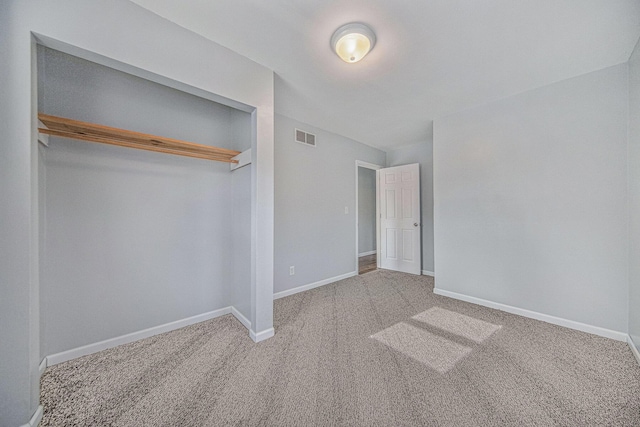 unfurnished bedroom featuring carpet flooring