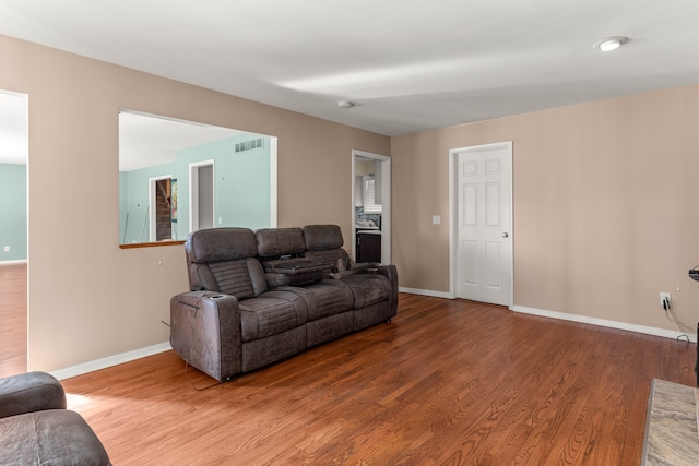 living room with hardwood / wood-style floors