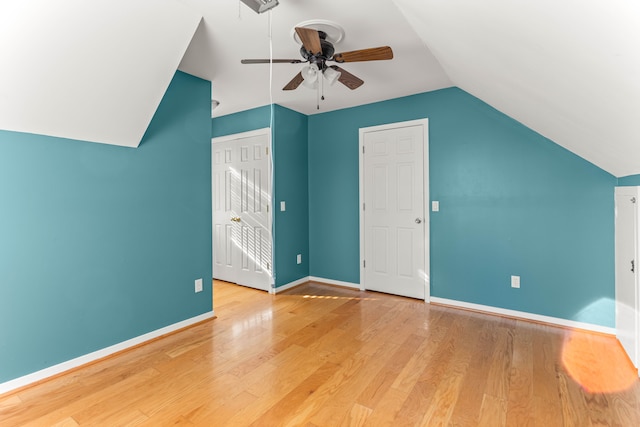 bonus room featuring ceiling fan, lofted ceiling, and light hardwood / wood-style floors