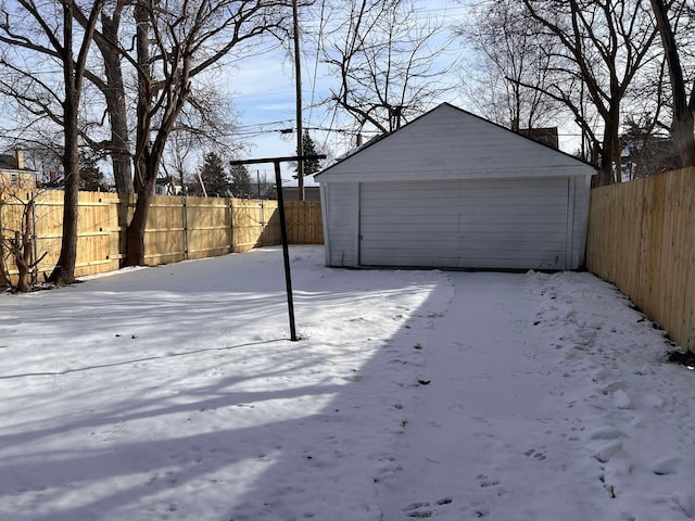 view of snow covered garage