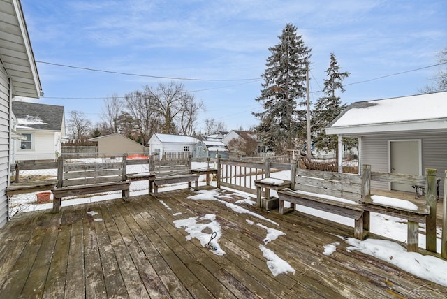 view of snow covered deck