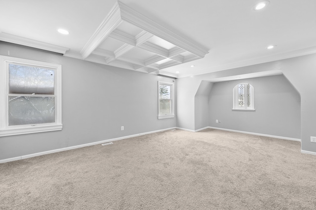 bonus room with carpet floors and beamed ceiling