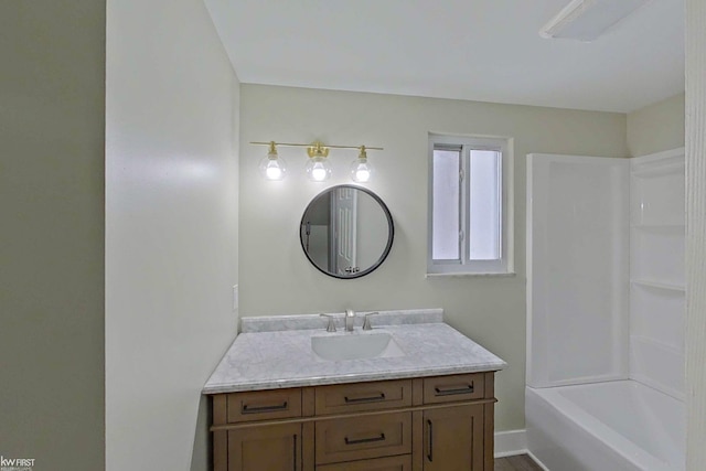 bathroom with vanity and bathing tub / shower combination