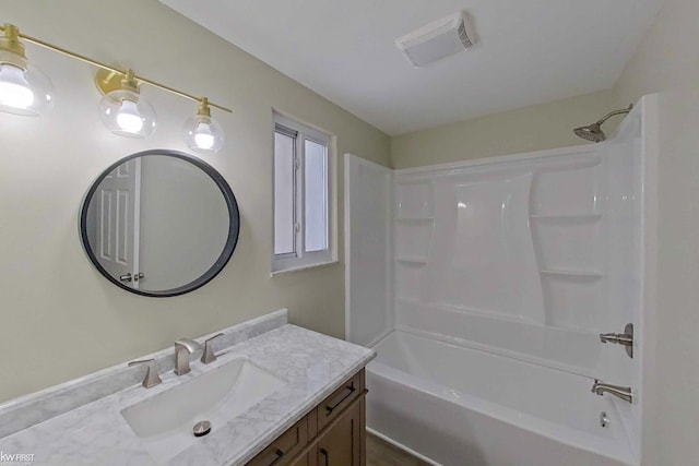 bathroom featuring vanity and tub / shower combination