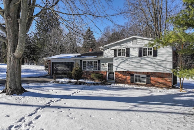 split level home with a garage