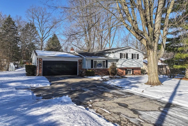 split level home with a garage