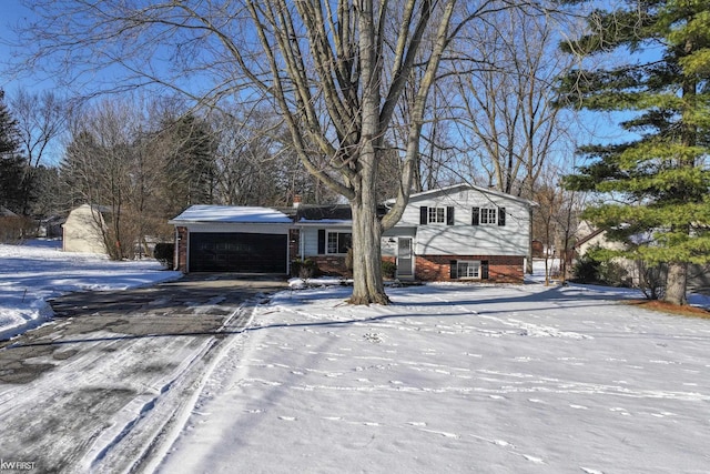 split level home featuring a garage