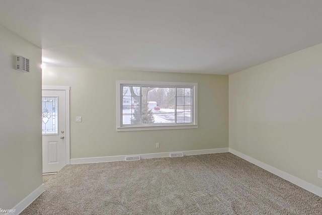 empty room with carpet flooring