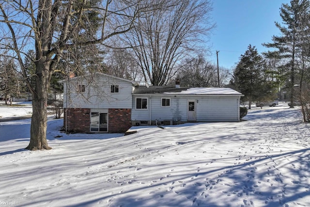 view of snow covered house